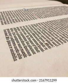 Oxford, OH USA - June 12, 2022: A page from a Gutenberg Bible shows the characteristic Textura typeface. Part of the collection of the Miami University Archives.