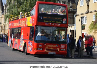 Oxford, Oxfordshire, England - September 28 2016: City sightseeing official open top tour bus with tourists