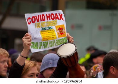 OXFORD STREET, LONDON, ENGLAND- 20 March 2021: Protester Holding A COVID HOAX Placard At The Vigil For The Voiceless Anti-lockdown Protest In London