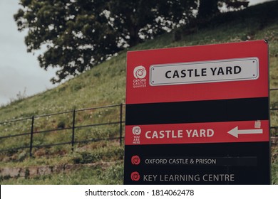 Oxford, UK - August 04, 2020: Close up of a directional sign in Oxford Castle Quarter, an area of the city housing Oxford Castle and Prison with a history spanning ten centuries.