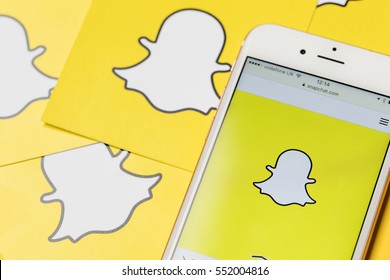 OXFORD, UK - JANUARY 9th 2017: An apple iPhone showing the Snapchat application alongside other Snapchat logos. Snapchat is a popular social media application for sharing messages,  images and videos