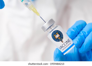 Oxford University Vaccine Against Coronavirus Collected Into The Syringe By Health Worker Or Doctor In Protective Gloves And PPE Suit, April 2021, San Francisco, USA