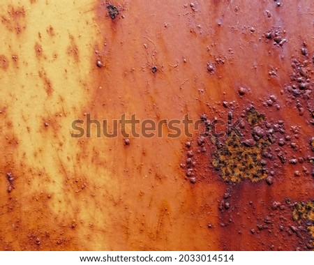 Oxidation of a metal surface showing rusting and corrosion.