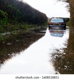 Oxted, Surrey, UK - December 14 2019 - BMW 7 Series Car Stuck In Flood Water In The UK