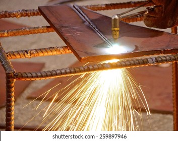 Oxygen and acetylene torch cutting steel with sparks  - Powered by Shutterstock