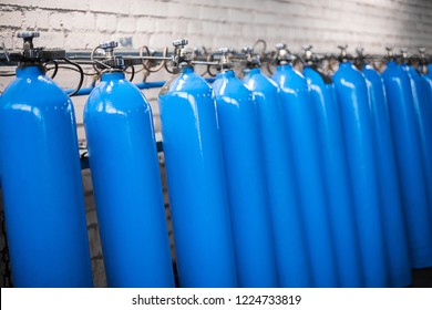 Oxygen Cylinder With Compressed Gas. Blue Oxygen Tanks For Industry. Liquefied Oxygen Production. Factory