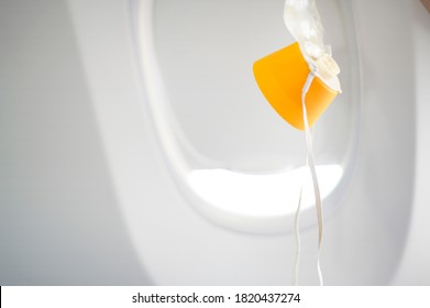 Oxygen Mask Drop From The Ceiling Compartment On Airplane