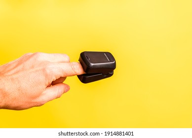 Oxygen saturation is measured with an oximeter, placed on the patient's finger. - Shutterstock ID 1914881401