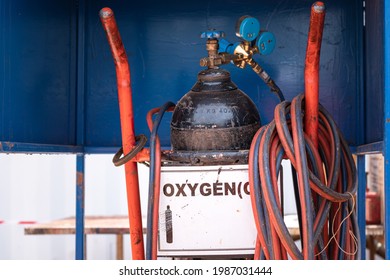 Oxygen In Steel Gas Cylinder, Stand By For Using In Emergency Case. Medical Industrial Equipment Object Photo. 