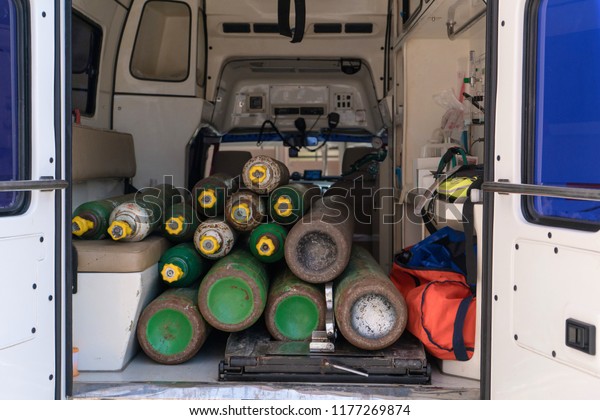 Oxygen tanks in the\
back of ambulance van