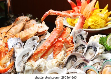 Oyster And Alaska King Crab, Seafood Buffet Line In Hotel Restaurant 