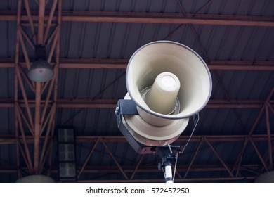 PA / Public Address System Speaker Under Stadium Roof On Rainy Day With Rain Drop On Speaker. PA Speaker System Concept.