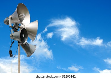 PA / Public Address system speakers, against a bright blue sky, with space for your text / editorial overlay - Shutterstock ID 58293142