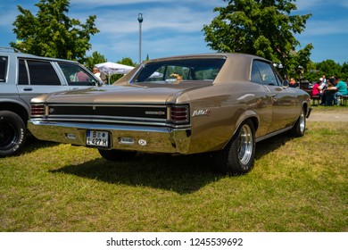 PAAREN IM GLIEN, GERMANY - MAY 19, 2018: Mid-size car Chevrolet Chevelle Malibu Super Sport (SS), 1965. Rear view. Die Oldtimer Show 2018. - Shutterstock ID 1245539692