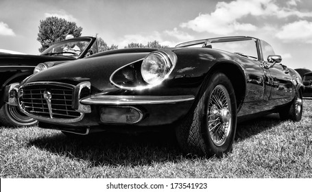 PAAREN IM GLIEN, GERMANY - MAY 19: A sports car Jaguar E-Type S3 V12 engine, black and white, The oldtimer show in MAFZ, May 19, 2013 in Paaren im Glien, Germany