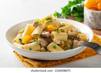 Paccheri Pasta With Swordfish, Cherry Yellow Tomato and zucchini. Close up. - Powered by Shutterstock