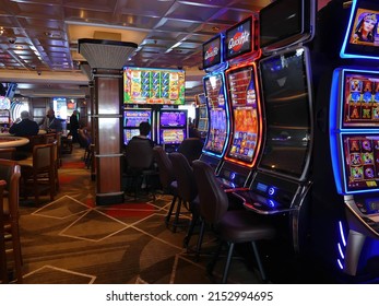 PACIFIC OCEAN - APR 27, 2022 - Slot Machines In A Cruise Ship Casino On