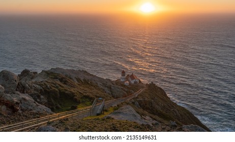 Pacific Ocean Sunset Moment And Cliff