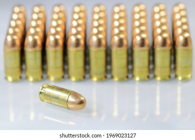 pack of bullet 11 mm or .45 acp FMJ (Full Metal Jacket ) ready for use, isolate on white background with selective focus.
