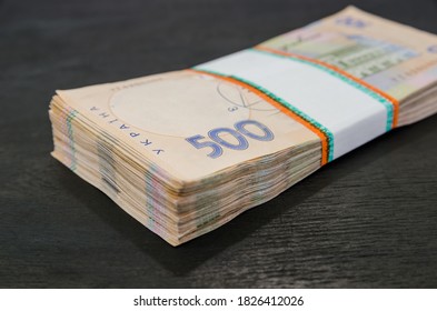 pack of hryvnias on a black background. Ukrainian money. 500 hryvnia banknotes. A lot of Ukrainian money. Close-up. - Shutterstock ID 1826412026