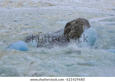 Pack ice and rocks.