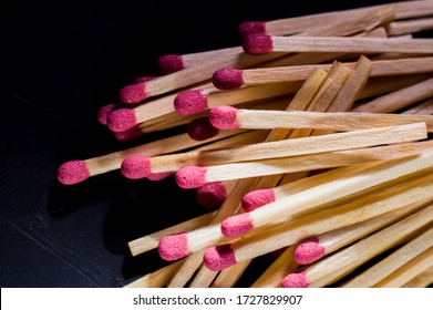 A Pack Of Matches In A Box. Light A Match.Matches In A Matchbox.pile Of Matches On A Dark Background.