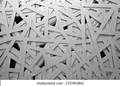 A Pack Of Metal Sheets With Cut Out Figures On A Laser Cutting Machine