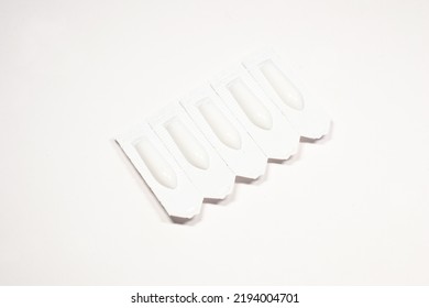 A pack of suppositories isolated on white background