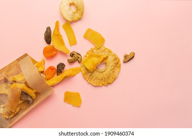 Package With Assorted Vegan Jerky On Pink Background, Top View With Copy Space