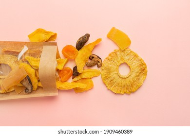 Package With Assorted Vegan Jerky On Pink Background, Top View