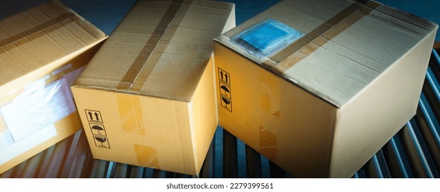 Package Boxes Sorting on Conveyor Belt. Cartons, Pacels Boxes. Storehouse. Distribution Warehouse. Shipping Supplies Cargo Shipment. Warehouse Logistics.	
