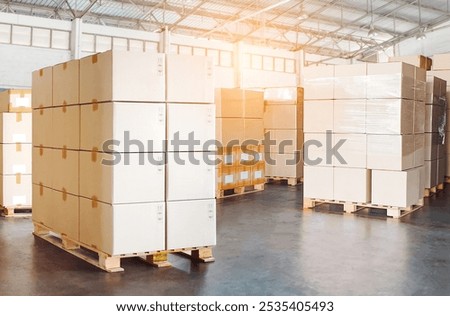 Package Boxes Stacked on Pallets in Storage Warehouse. Cartons, Cardboard Boxes, Business e- commerce. Bulk Goods Pallets. Supply Chain, Supplies Shipment. Storehouse, Warehouse Shipping Logistics.	
