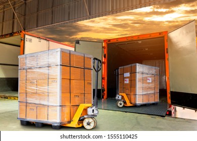 Package Boxes Wrapped Plastic Film on Pallet with Forklift Pallet Jack. Supply Chain. Loading Dock Warehouse. Cargo Shipment Boxes Warehouse Logistics Cargo Transportation.	

