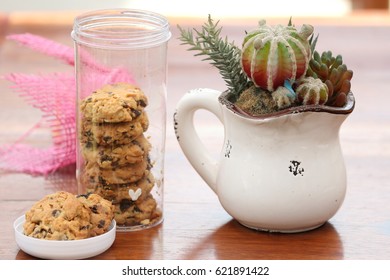 A package of cookie on brown table selective focus on piece of cookie, soft background behind 