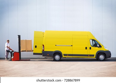 Package Delivery, Courier Is Loading The Van With Parcels.