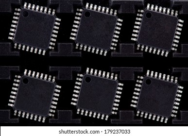 package of six microcontrollers as a background