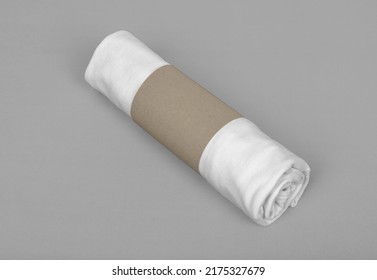 Package with white T-shirt roll mockup template with copy space for your logo or graphic design
