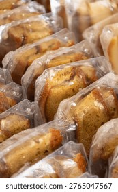 Packaged Mini Cakes in Plastic Containers Close Up Bakery Display
