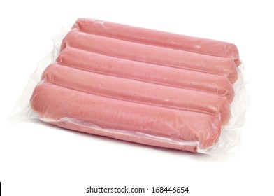 Packaged Raw Hot Dogs On A White Background