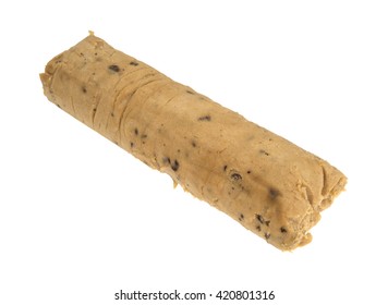 A Packaged Roll Of Chocolate Chip Cookie Dough Isolated On A White Background.