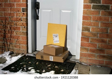 Packages Delivered And Left On The Front Step.