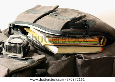 Packaging bag and put it in a notebook with records and a notebook with a cam action in case