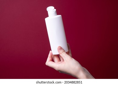 Packaging Of Lotion Or Hand Cream In Female Hands