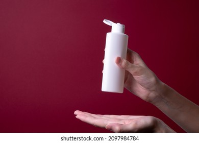 Packaging Of Lotion Or Hand Cream In Female Hands