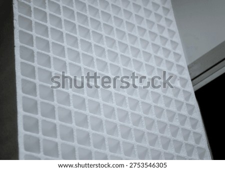 Packaging material made of expanded polystyrene or expanded polyethylene EPE. Model of dense and lightweight EPP, expanded polypropylene material, universal foam. New modern industrial technologies.