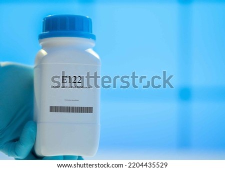 Packaging with nutritional supplements E122 Color additive Red to maroon