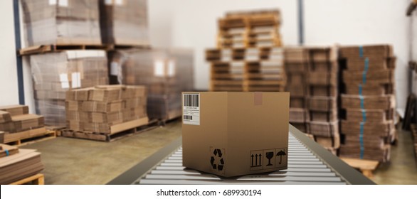 Packed parcel box on conveyor belt against many stack of cardboard boxes