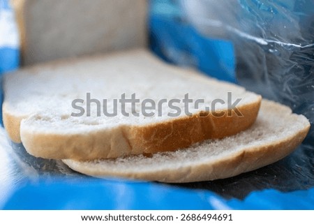 A packet of white sliced bread