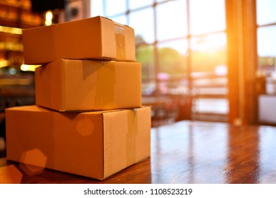 Packing Accessories At Workplace Of Startup Small Business Owner, Cardboard Parcel Box For Online Selling. Entrepreneur, SME Seller's Desk. E-commerce, Shipping Concept