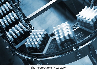 Packing of beer on a tape of the conveyor